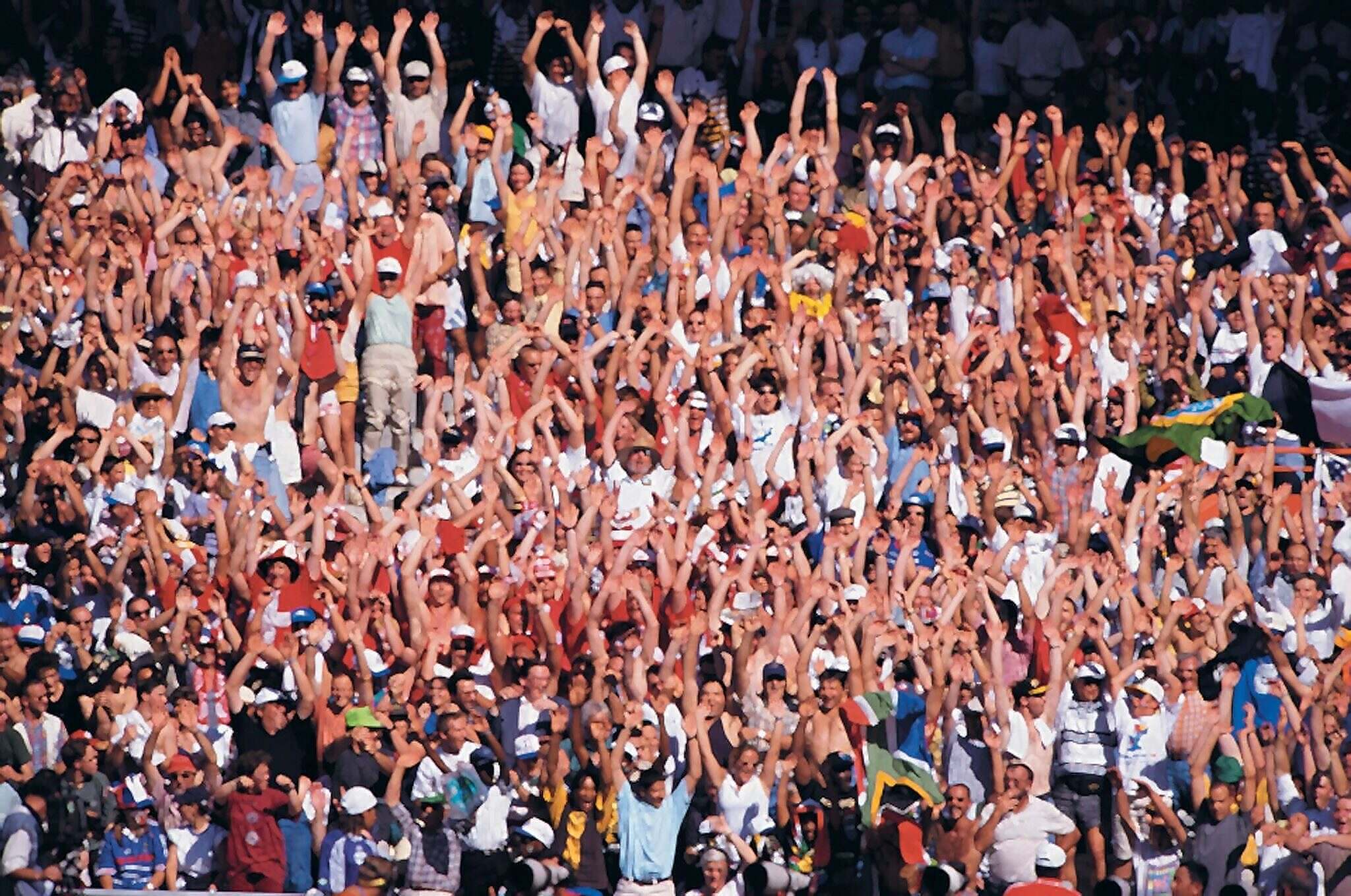 Let's talk about Piggy Back Message. Image of a large crowd.